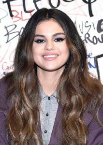 Selena Gomez's Long Curled Hairstyle - 20191029