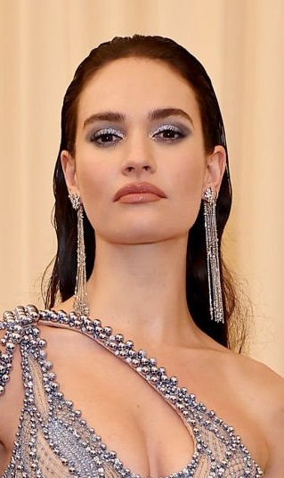 Lily James' Long Slicked Back Hairstyle - 20220502