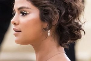 Selena Gomez – Curly Updo – Heavenly Bodies: Fashion & The Catholic Imagination Costume Institute Gala