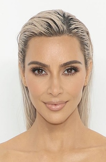 Kim Kardashian - Icy Blonde Slicked Back Hairstyle - 20221107