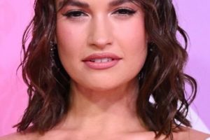 Lily James – Medium Length Curled Hairstyle (2023) – “What’s Love Got To Do With It?” UK Premiere