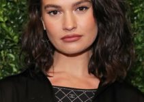 Lily James – Medium Length Curled Hairstyle (2023) – The Charles Finch & CHANEL 2023 Pre-BAFTA Party