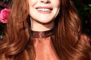 Lindsay Lohan – Long Curled Hairstyle (2023) – New York Fashion Week
