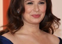 Katie Lowes – Long Curled Hairstyle (2023) – 95th Annual Academy Awards