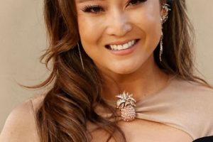 Ashley Park – Long Curled Hairstyle (2023) – Second Annual Gold Gala